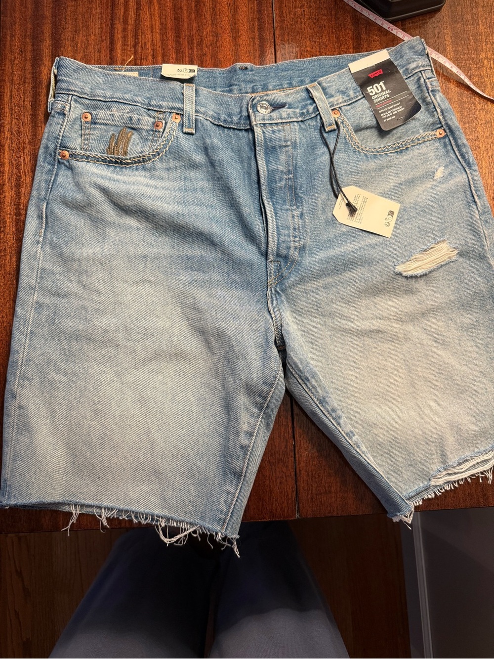 Levi's light blue denim jeans with embroidery detail